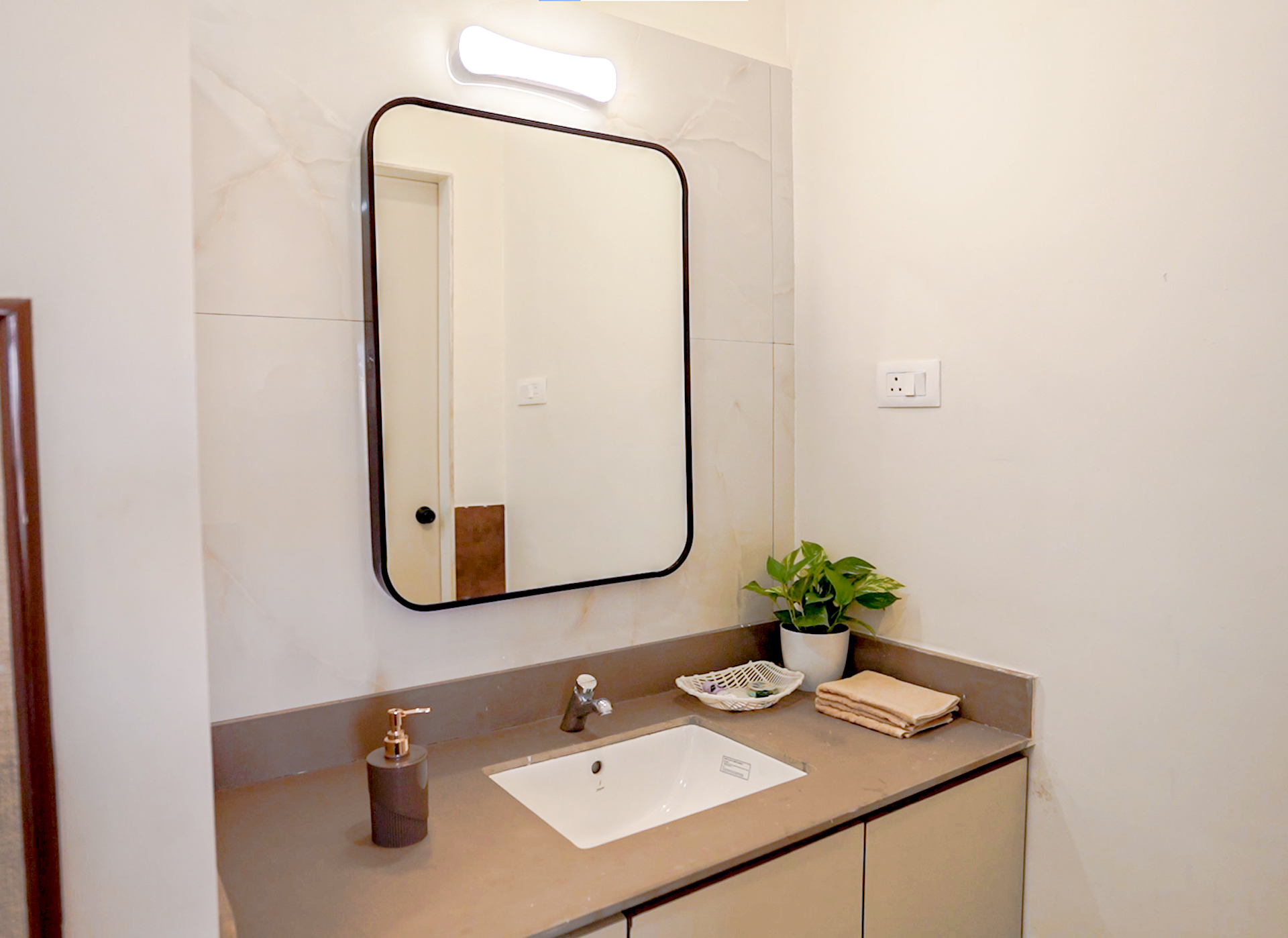 Clean washroom with safety grab bars